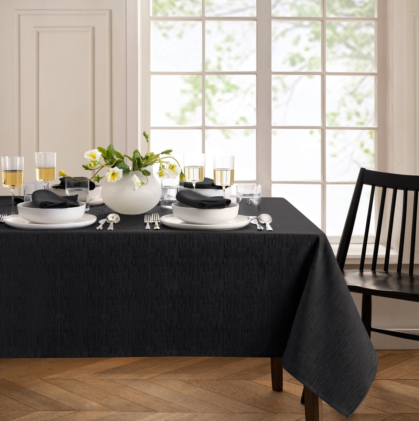 Mantel continental resistente al agua y a las manchas de textura sólida