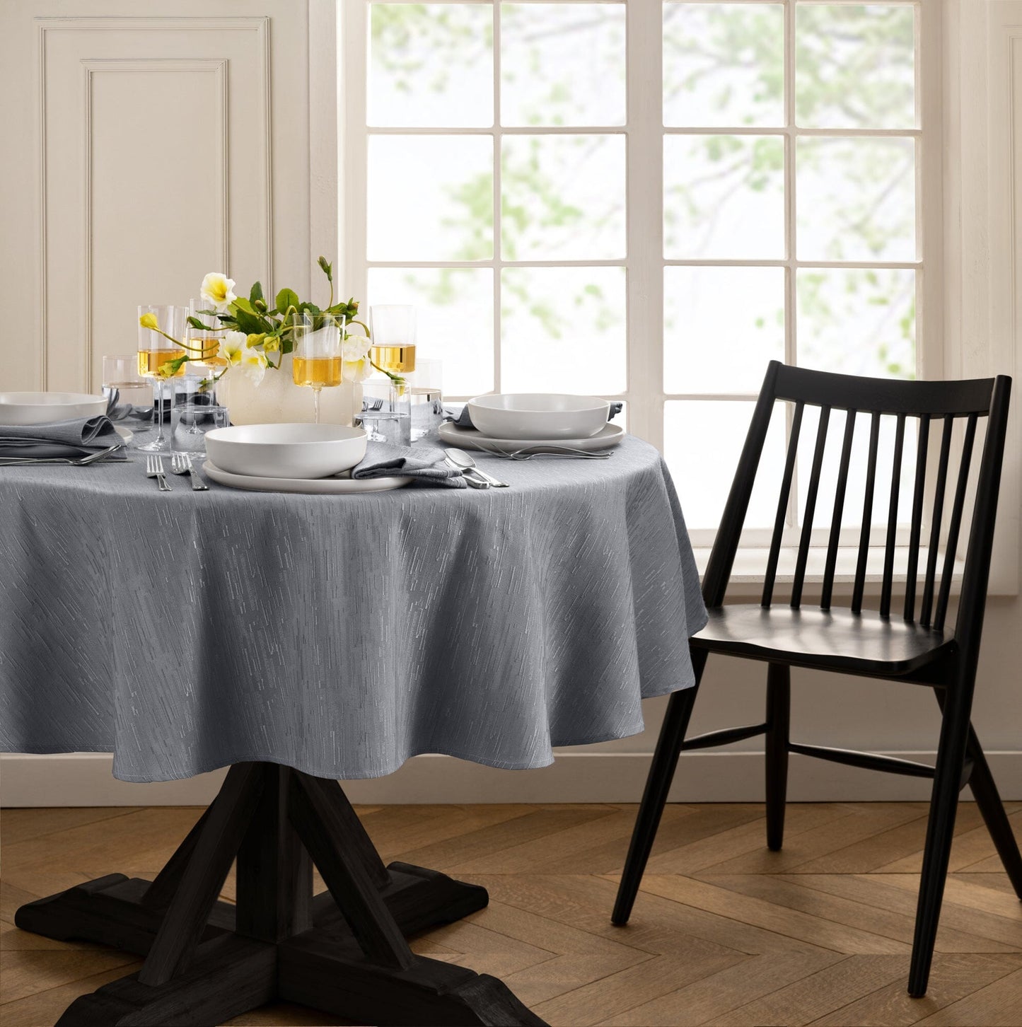 Mantel continental resistente al agua y a las manchas de textura sólida
