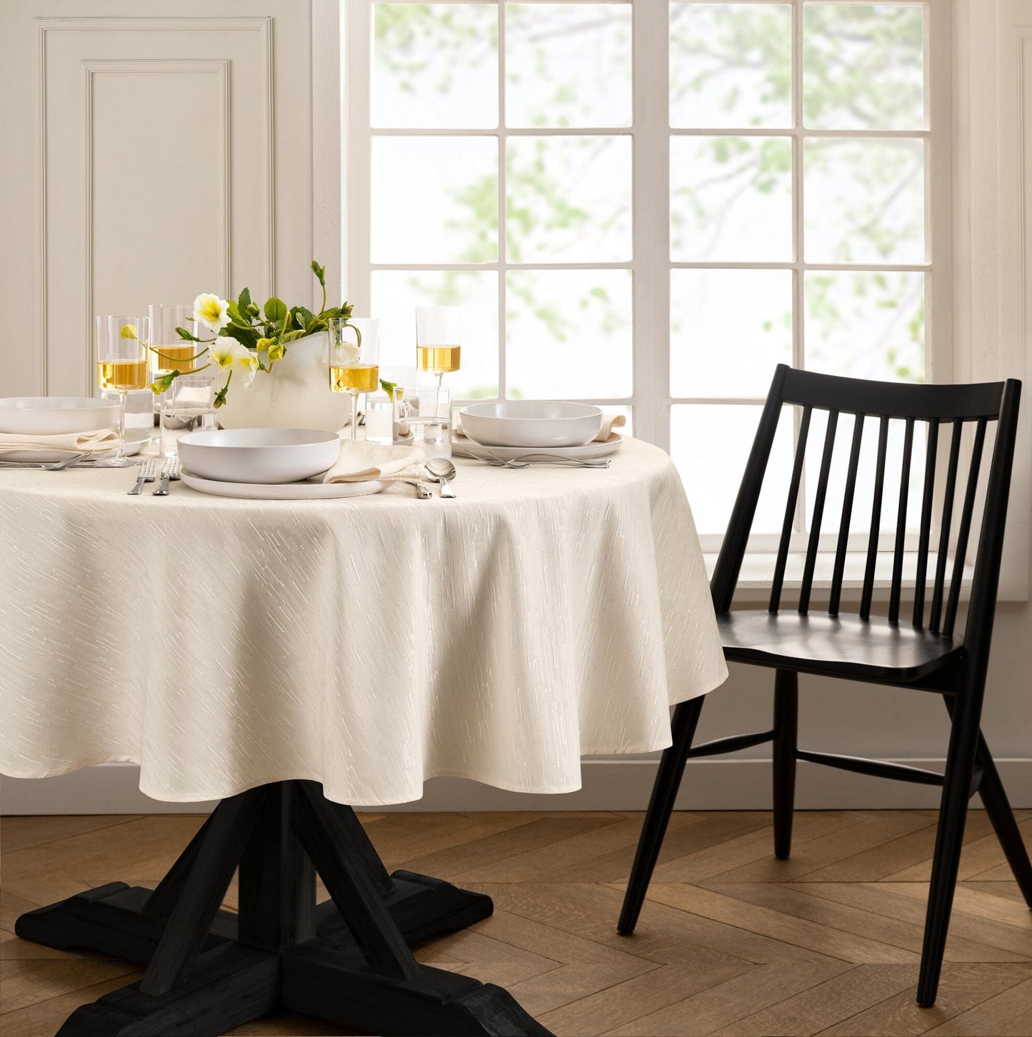 Mantel continental resistente al agua y a las manchas de textura sólida