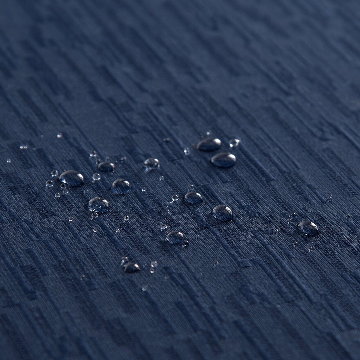 Mantel continental resistente al agua y a las manchas de textura sólida