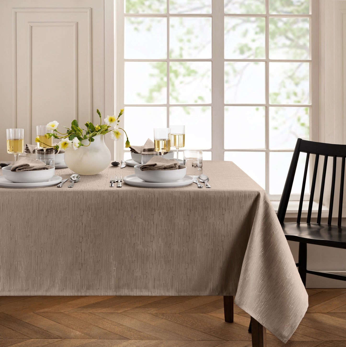 Mantel continental resistente al agua y a las manchas de textura sólida