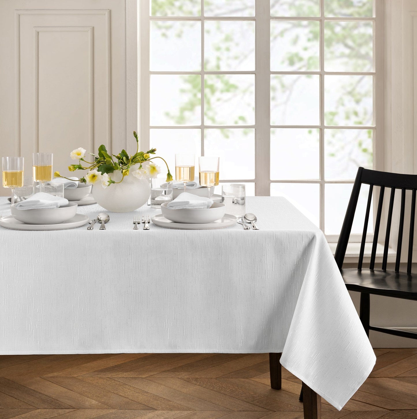 Mantel continental resistente al agua y a las manchas de textura sólida